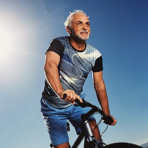 adult-man-riding-a-bike